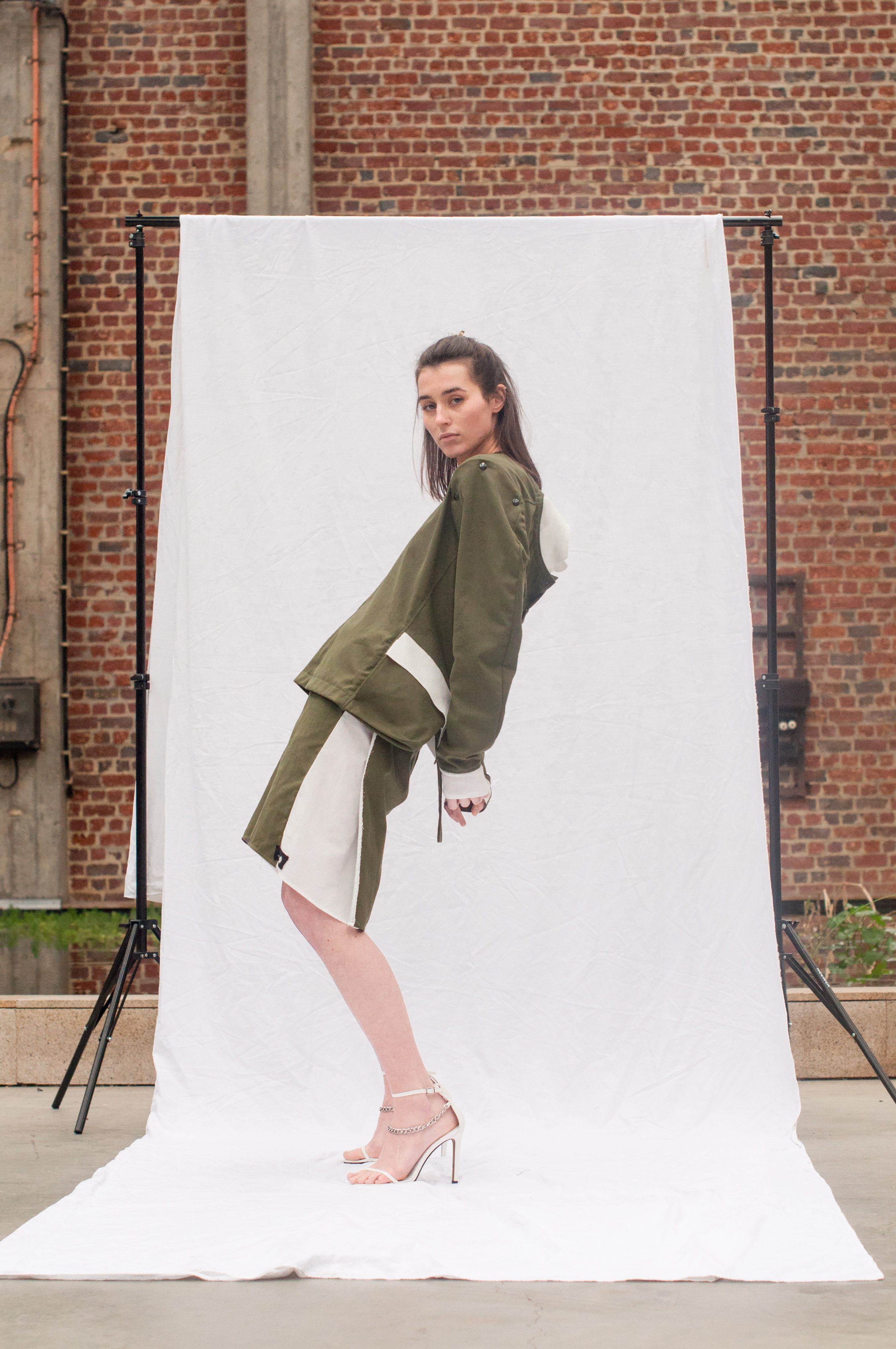 khaki jacket with removable sleeves and flippable front back by anna tanaka